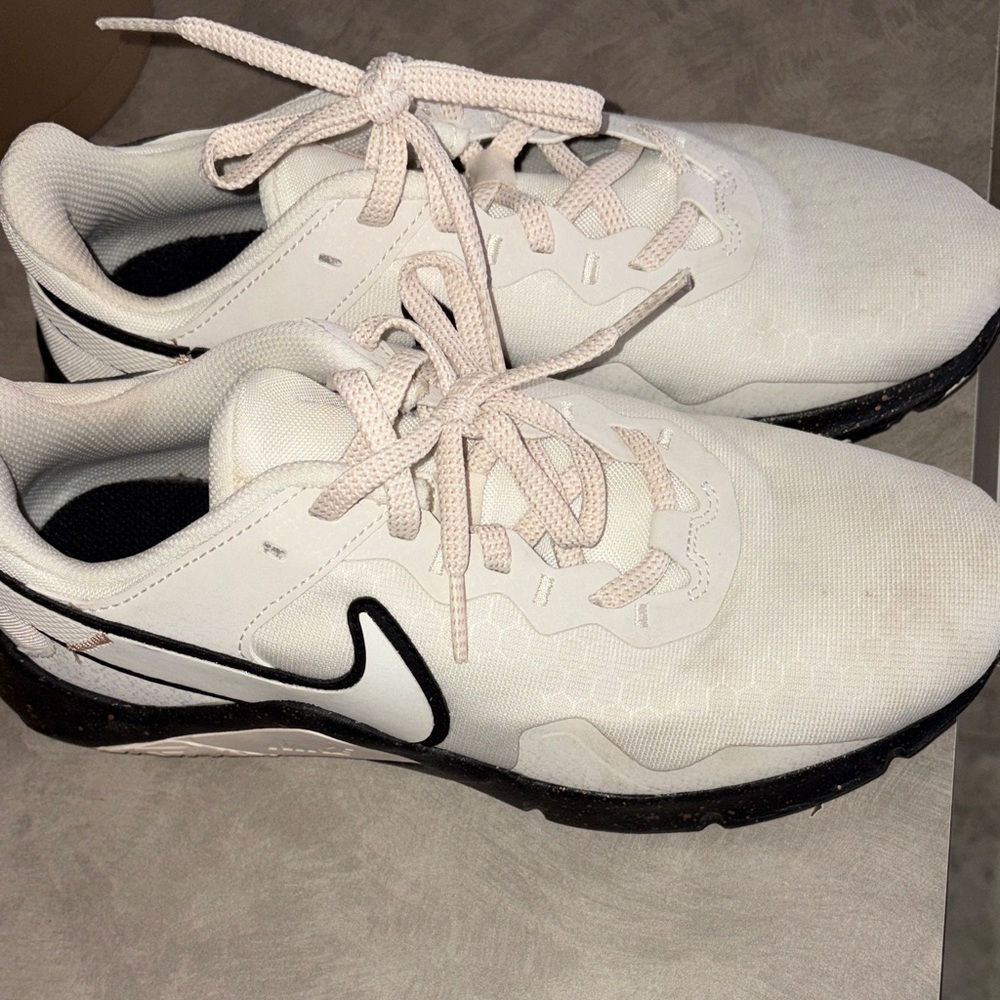 Nike White Sneakers with Black Swoosh